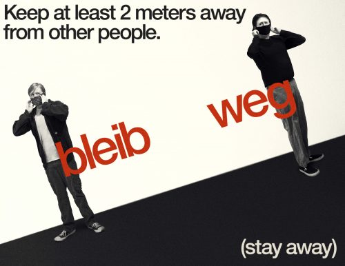 Two people in masks social distancing with bleib weg (stay away) text, illustrating COVID-19 safety guidelines