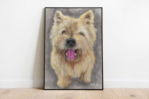 Framed Yorkshire Terrier dog portrait painting with pink tongue, displayed on wooden floor against white wall