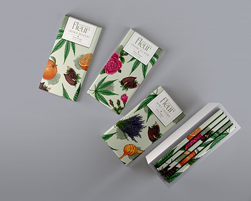 Fleur seed packets with colorful botanical illustrations featuring flowers, fruits and vegetables on white background