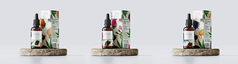 Three dark glass dropper bottles with botanical packaging displayed on wooden shelves against white wall