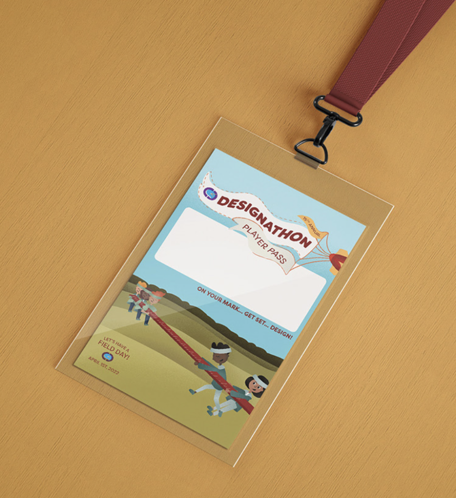 Designathon player pass ID badge with lanyard on wooden surface for design competition event